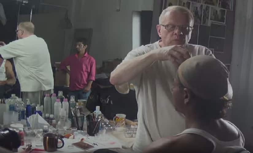 Greg Cannom woks on Shah Rukh Khan's 'Gaurav' look. Screen grab from YouTube