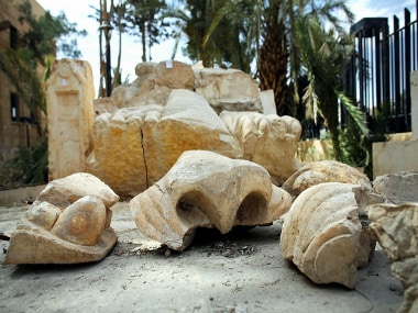 The damaged Lion of Al-Lat statue is seen on 11 April 11 in Palmyra. Getty Images