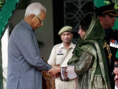 Jammu and Kashmir Governor NN Vohra administers the oath to Chief Minister Mehbooba Mufti, at Raj Bhawan in Jammu on Monday. PTI