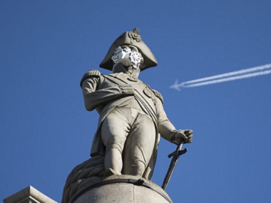 Activists protesting air pollution fit London statues with gas masks Activists protesting air pollution fit London statues with gas masks
