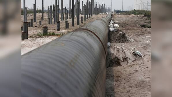 Oil prices jump as Goldman Sachs says market flips into deficit