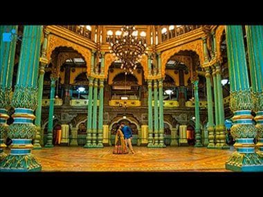 The pre-wedding photo shoot inside the Durbar Hall in the Mysore Palace drew ire from all quarters. Photo courtesy: YouTube/7 Rainbows