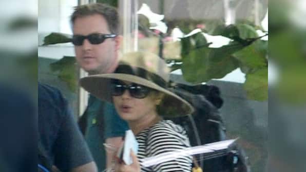 Flying high: Preity Zinta spotted with husband Gene Goodenough at Mumbai airport