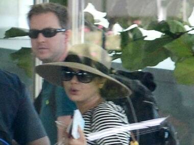 Flying high: Preity Zinta spotted with husband Gene Goodenough at Mumbai airport