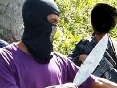 Abu Sayyaf releases new video, threatens to kill three more hostages Abu Sayyaf releases new video, threatens to kill three more hostages