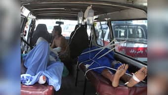 Afghan road crash inferno leaves at least 73 dead