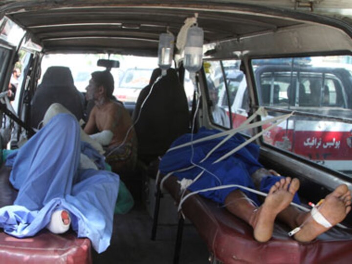 Afghan road crash inferno leaves at least 73 dead