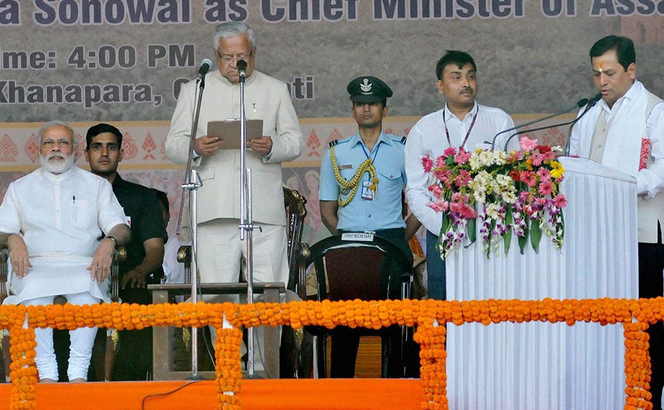 Assam Governor PB Acharya administers the oath to Sarbananda Sonowal as Chief Minister of Assam in presence of Prime Minister Narendra Modi in Guwahati on Tuesday. PTI Assam Governor PB Acharya administers the oath to Sarbananda Sonowal as Chief Minister of Assam in presence of Prime Minister Narendra Modi in Guwahati on Tuesday. PTI