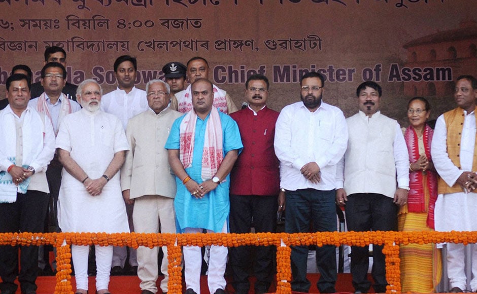 The newly sworn-in Assam Chief Minister Sarbananda Sonowal along with his 14 cabinet ministers after the swearing-in ceremony in Guwahati on Tuesday. PTI The newly sworn-in Assam Chief Minister Sarbananda Sonowal along with his 14 cabinet ministers after the swearing-in ceremony in Guwahati on Tuesday. PTI