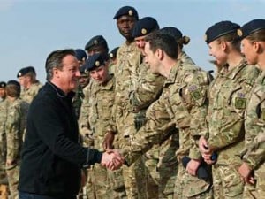 File photo of UK PM David Cameron with British troops. AP