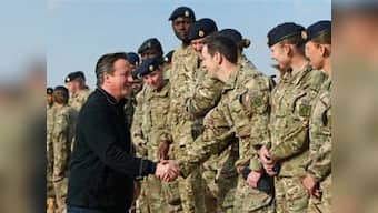 UK PM Cameron apologises to cleric for calling him Islamic State supporter