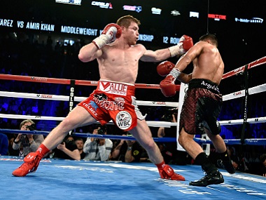 Canelo Alvarez knocks Amir Khan out, defends World Boxing Council middleweight belt Canelo Alvarez knocks Amir Khan out, defends World Boxing Council middleweight belt