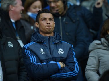 Real Madrid's Cristiano Ronaldo stands in the crowd as a spectator during the first leg. AFP