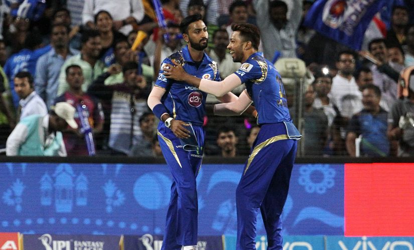 Mumbai Indians player Krunal Pandya and Hardik Pandya celebrate a wicket during IPL 9. SportzPics