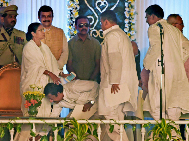 Bengal portfolios: Mamata keeps home, retains Mitra as finance minister Bengal portfolios: Mamata keeps home, retains Mitra as finance minister