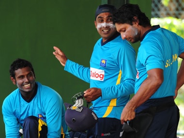 File photo of Mahela Jayawardene with captain Angelo Mathews and Kumar Sangakkara. AFP