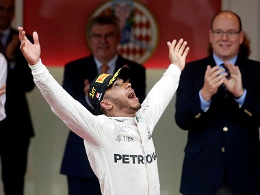 Lewis Hamilton celebrates after winning the Monaco Grand Prix. AP