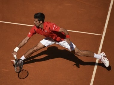 Novak Djokovic returns a ball at the Madrid Open. AFP