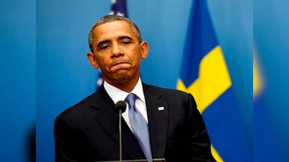 'Building walls' won't change world: Obama rebukes Trump's policies and views