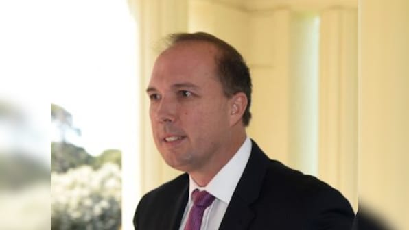 Australian minister under fire for 'illiterate' refugees comment
