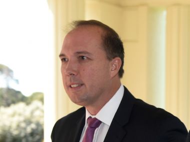 Australian minister under fire for 'illiterate' refugees comment Australian minister under fire for 'illiterate' refugees comment