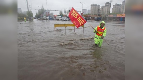 Torrential downpour kills 8 in China, blue alert for next 24 hours