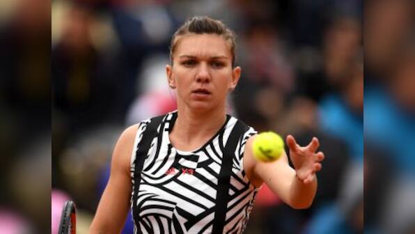 French Open 2016: Simona Halep battles past Naomi Osaka, Garbiñe Muguruza eases into last 16