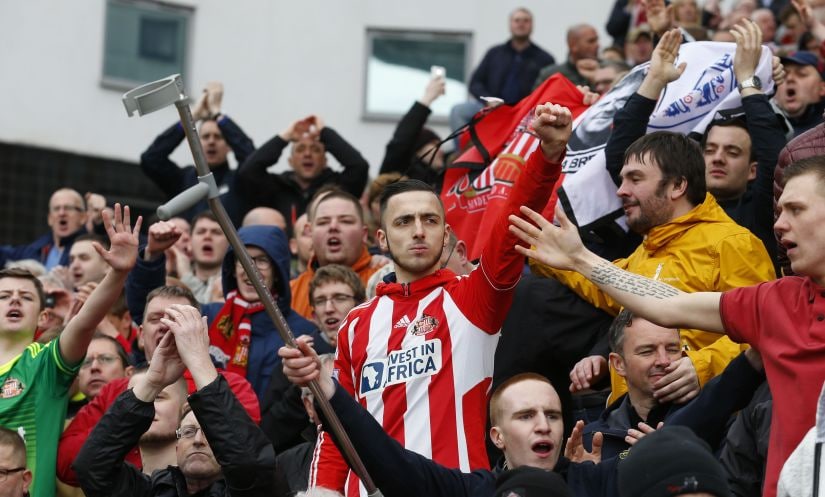 Sunderland fans celebrate their survival in the top-flight of English football. AFP