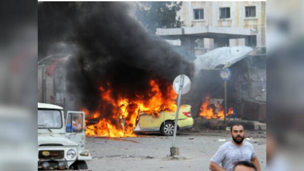 Suicide car bombs kill 120 in Syria regime bastions; Islamic State claims responsibility