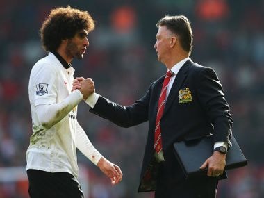 Louis van Gaal, manager of Manchester United with Marouane Fellaini. Getty