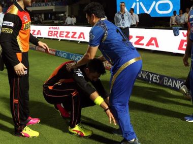 Yuvraj Singh touching Sachin Tendulkar's feet after SRH's win over MI. Image Courtesy: Twitter