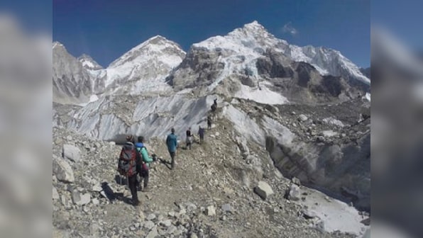 Littered with bodies, it's a risky effort to recover the dead from Mount Everest