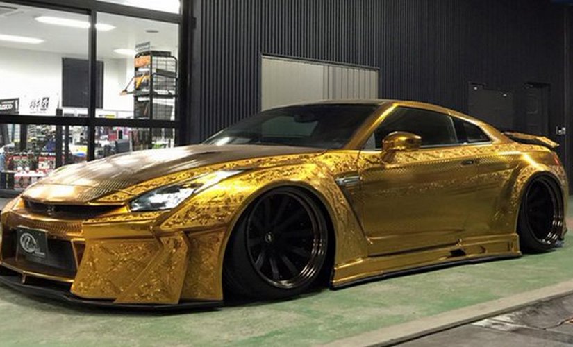 Gold-plated 'Godzilla': Customised car worth $ 1 mn put up on display in Dubai Gold-plated 'Godzilla': Customised car worth $ 1 mn put up on display in Dubai
