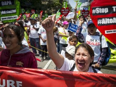 May Day marchers take to the streets of Los Angeles, calling for immigrant and worker rights. AP