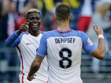 Gyasi Zardes celebrates with Clint Dempsey after scoring against Ecuador. AFP