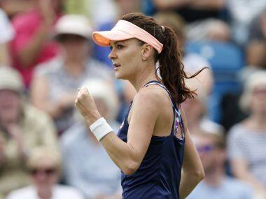 Poland’s Agnieszka Radwanska celebrates victory in the third round. Reuters