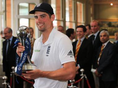 Alastair Cook with the Investec trophy. AFP
