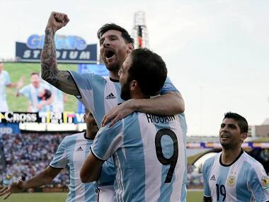 Argentina's Lionel Messi and Gonzalo Higuain celebrate a goal against Venezuela in the Copa America. AP