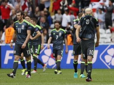 Aaron Ramsey and Wales players react at the end of the loss against England. Reuters
