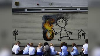 Banksy strikes again, gifts Bristol elementary school a mural