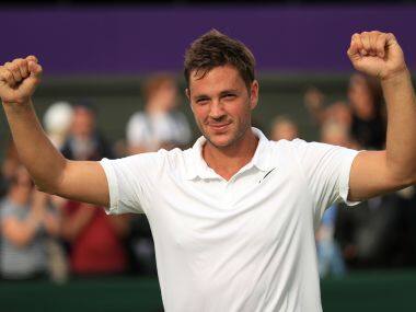 Britain's Marcus Willis, the world number 772, celebrates his victory over 54th-ranked Lithuania's Ricardas Berankis. AP
