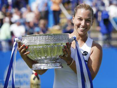 Slovakia’s Dominika Cibulkova celebrates victory with the Eastbourne trophy. Reuters