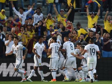 Colombia players celebrate a goal against Paraguay in their 2-1 win in Copa America Centenario. AFP