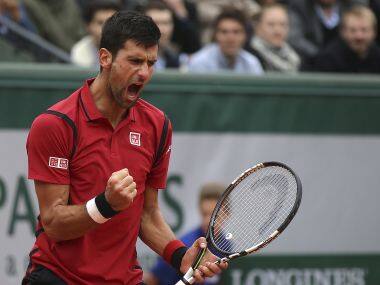 Serbia’s Novak Djokovic celebrates winning the French Open semi-final. AP