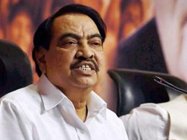 Eknath Khadse quits Maharashtra cabinet, BJP top brass firm on probity Eknath Khadse quits Maharashtra cabinet, BJP top brass firm on probity