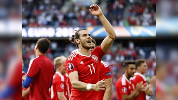 Euro 2016: Gareth McAuley's own goal breaks Northern Ireland hearts as Wales advance