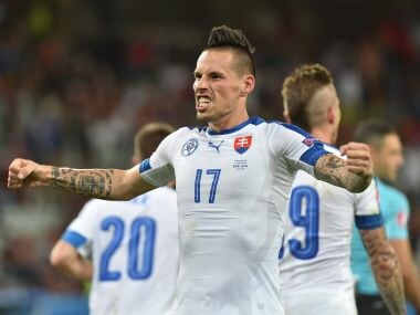 Slovakia's midfielder Marek Hamsik celebrates his goal against Russia. AFP