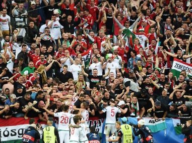 Hungary's players celebrate with fans after their win over Austria. AFP