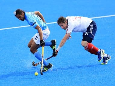 India’s Akashdeep Singh and Great Britain’s Iain Lewers battle for the ball during the FIH Men’s Champions Trophy. AFP