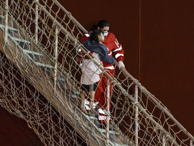 Italy recovers 2015 sunk migrant boat, hopes to ID victims Italy recovers 2015 sunk migrant boat, hopes to ID victims